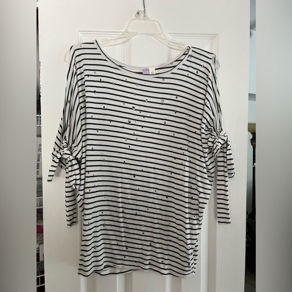 Mid length cut out sleeve top